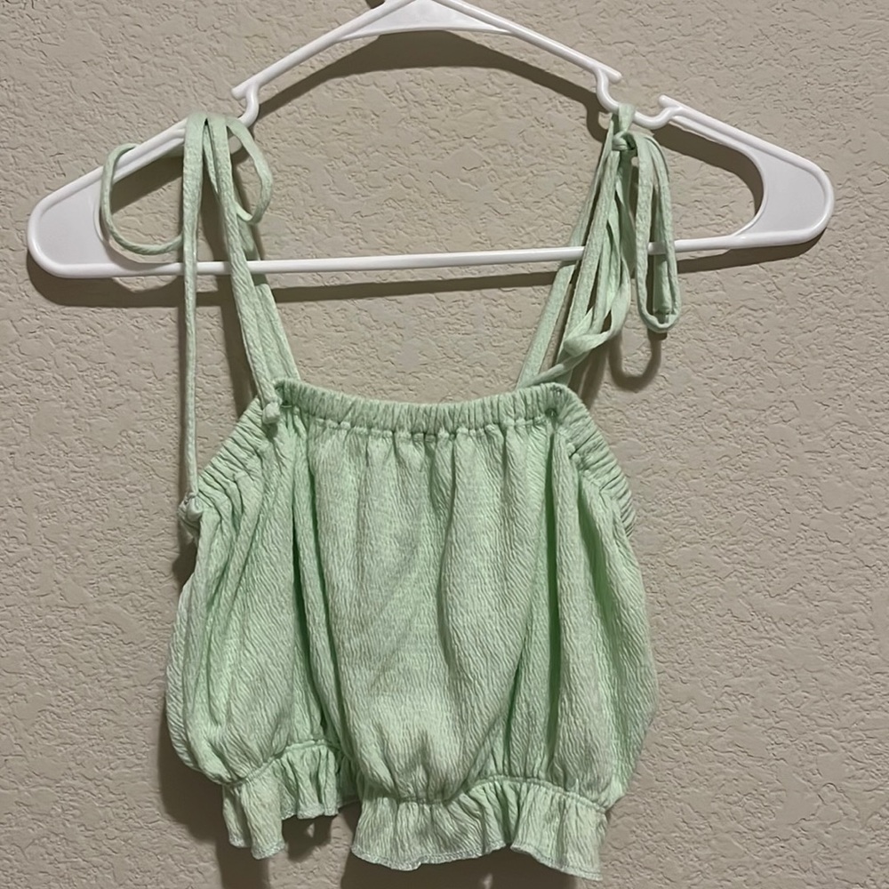 green top with adjustable straps